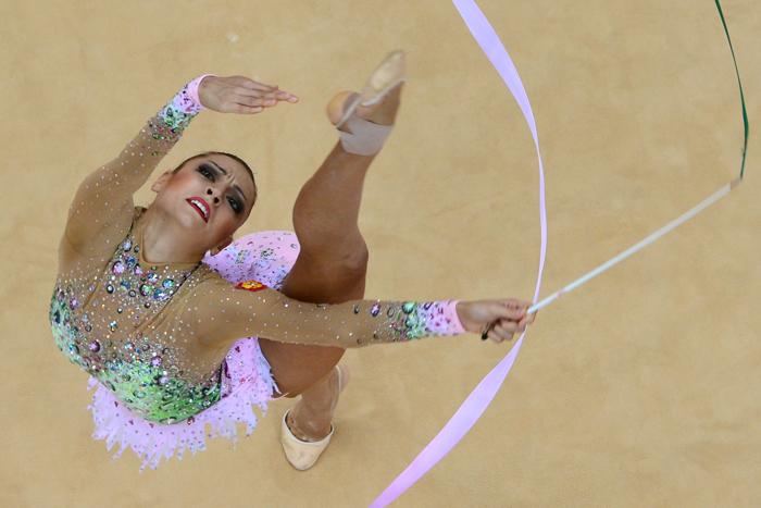 Фоторепортаж о выступлении Евгении Канаевой в финале олимпийских соревнований по художественной гимнастике. Фото: Jamie Squire / Getty Images